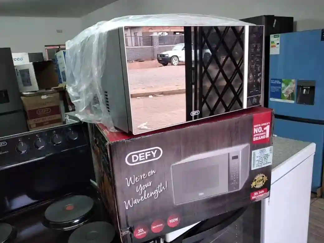 Defy Microwave 30Ltrs brand new boxed Mirror Finish, Touch Screen