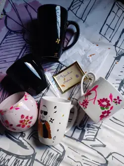 Handpainted mug with designed frame