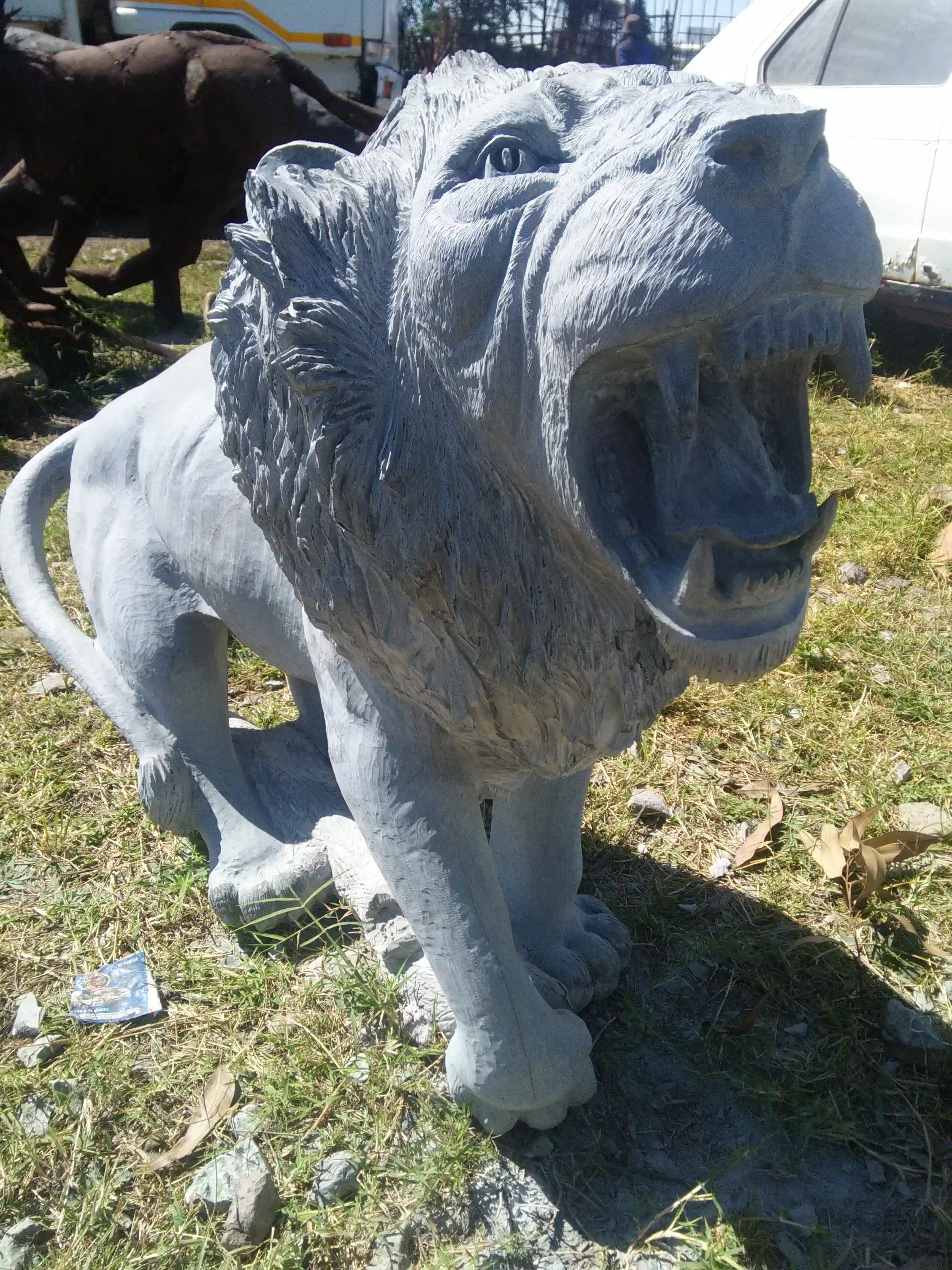 STONE SCULPTOR OF A LION FOR SALE ZIMBABWE