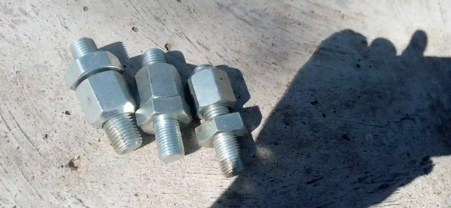 Trailer wheel studs and nuts