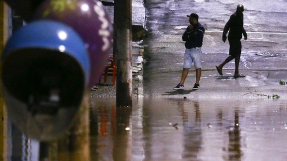 Brazil rains: São Paulo floods kill 21 and destroy homes