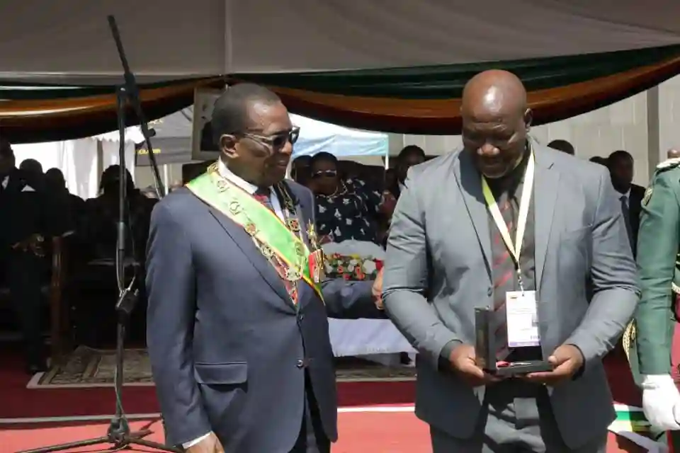 Mnangagwa Honours Truck Driver Sirizani Butau's Bravery With Gold Cross Medal