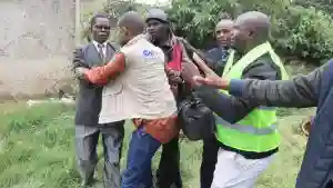 PICTURES: Security At MDC Rally Harass Journalist
