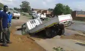 Truck Plunges Into Pothole Along Bulawayo's Khami Road