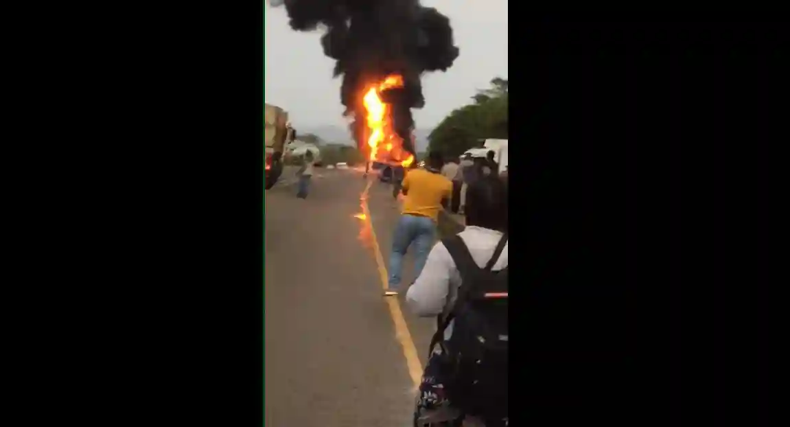 WATCH: Fuel Tanker Bursts Into Flames After Head-on Collision With A Bus