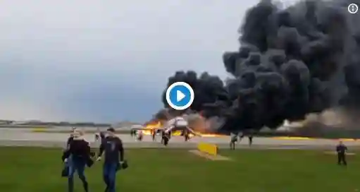 WATCH: Passengers Escape From Burning Russian Airplane
