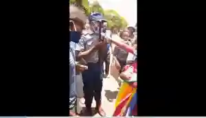 WATCH: Police Officer Strikes, Kills Little Baby With Baton In Harare