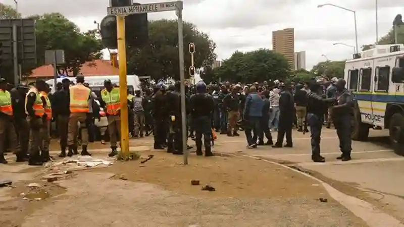 WATCH: Scores Of Protesters March Towards Hillbrow, South Africa