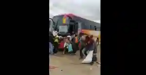 WATCH: Woman Wails At Bus Terminus As Touts Jostle For Her Luggage