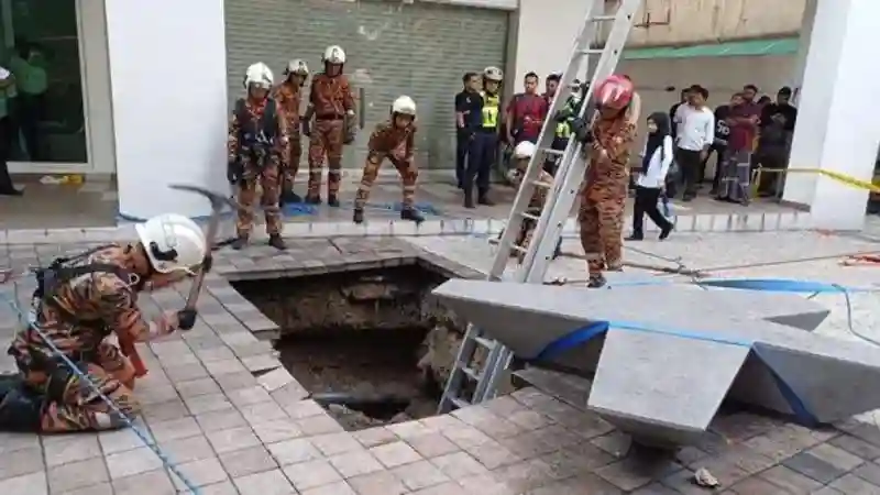 Woman Swallowed By A Pavement Sinkhole In Malaysia