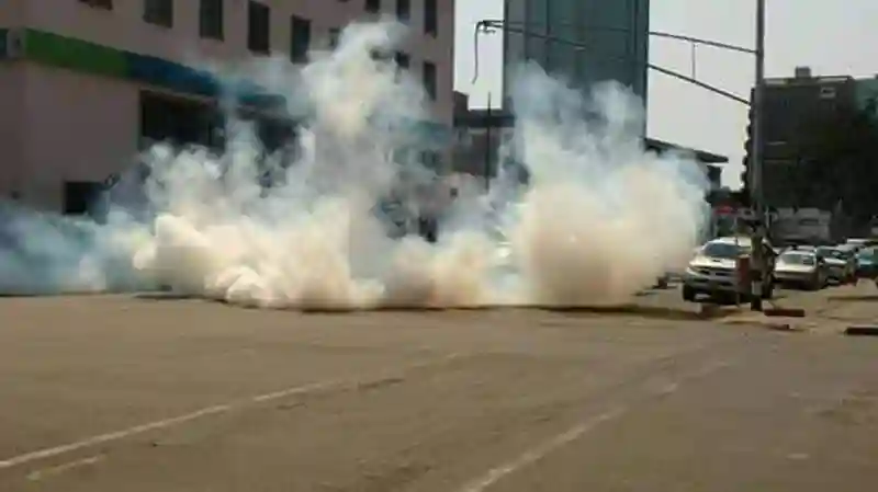 Zimbabwe Police Throw Tear Smoke At An Occupied Bus