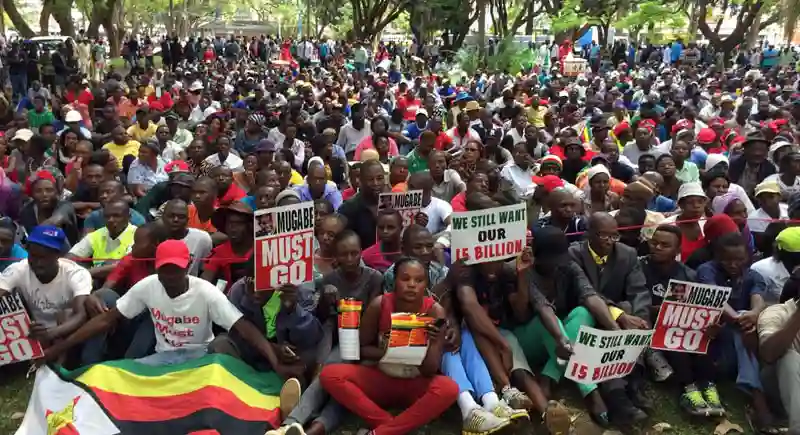 Zimbabweans gathered outside parliament ahead of Mugabe impeachment proceedings